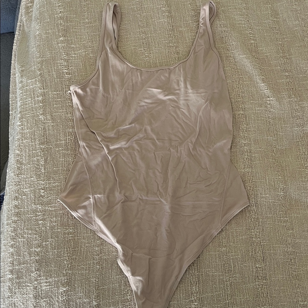 Lulu Lemon Ballet Pink Body Suit